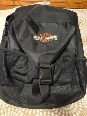 Harley-Davidson Black Backpack / travel bag . Very roomy . Orange Logo Patch